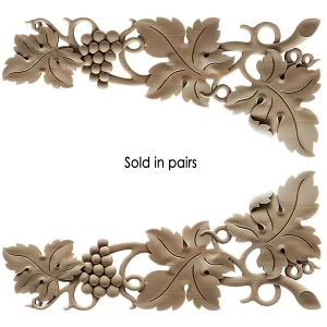 pair of Circular rosette featuring hand-carved grape motifs and decorative flourishes