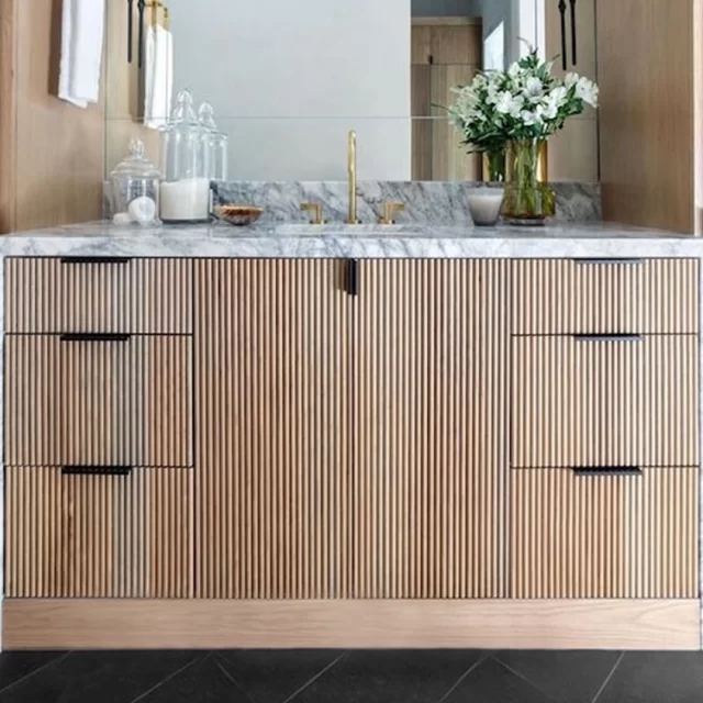 Installation of slatted painted tambour panels in a Fort Wayne commercial space