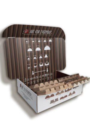 Flexible tambour panel sample kit in solid wood and MDF, showing different profiles and catalog packaging.