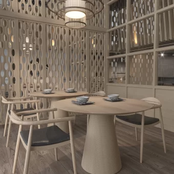 A contemporary commercial sitting space featuring Texture Panel K used as a floor-to-ceiling decorative room divider, offering a sophisticated geometric screen for privacy in an open-concept room.