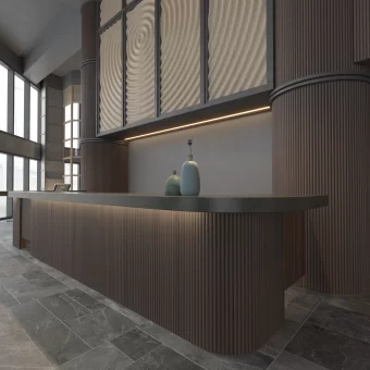 A sleek commercial bar area featuring vertical tambour paneling on the counter base and a stunning accent wall made of solid wood texture panels with a unique 3D "droplet" or "ripple" effect.