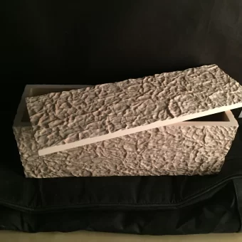 A luxury wine box designed for corporate gifting, featuring a realistic 3D bark texture applied through specialized custom wood fabrication.