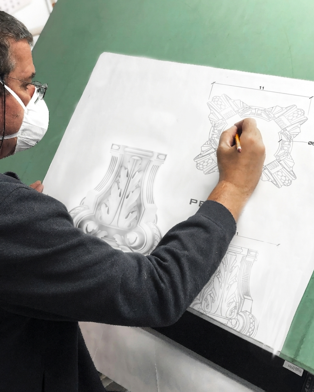Artisan creating a hand sketch for custom woodwork and decorative millwork design